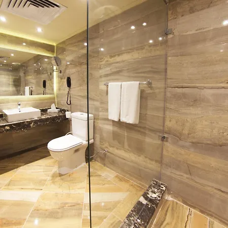 Pyramisa Suites Hotel Cairo Giza Экстерьер фото A bathroom at the hotel