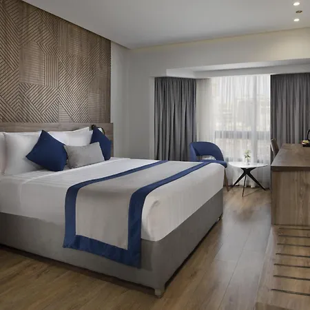 Pyramisa Suites Hotel Cairo Giza Экстерьер фото A room at the hotel