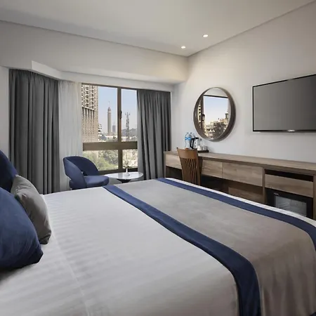 Pyramisa Suites Hotel Cairo Giza Экстерьер фото A room at the hotel