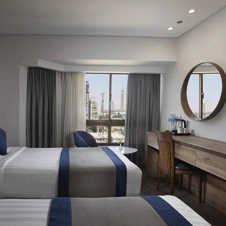 Pyramisa Suites Hotel Cairo Giza Экстерьер фото A room at the hotel
