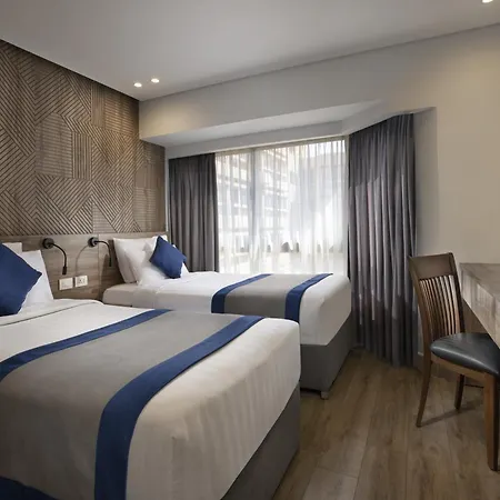 Pyramisa Suites Hotel Cairo Giza Экстерьер фото A room at the hotel